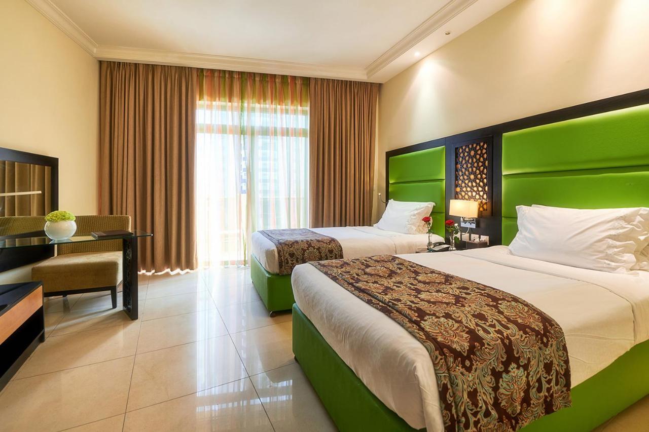 Bahi Ajman Palace Hotel Exterior foto Deluxe Room